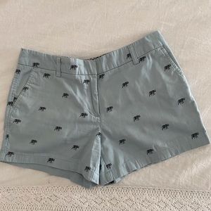 Light blue shorts with embroidered black elephants
